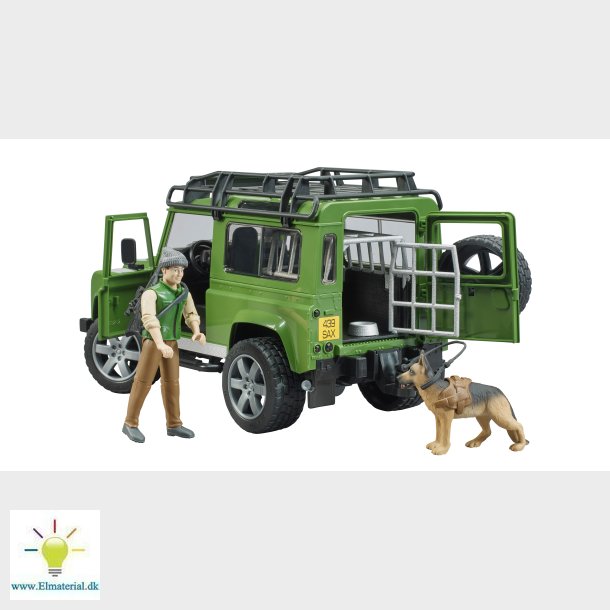 Land Rover Defender Station Wagon med skov og hund
