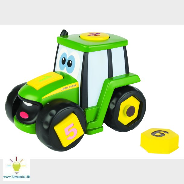 Johnny lre og spille traktor