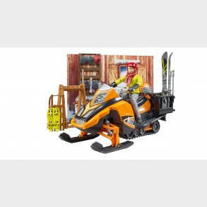 Bjerghytte med snescooter