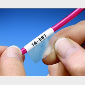 Sj&auml;lvlaminerad etikett